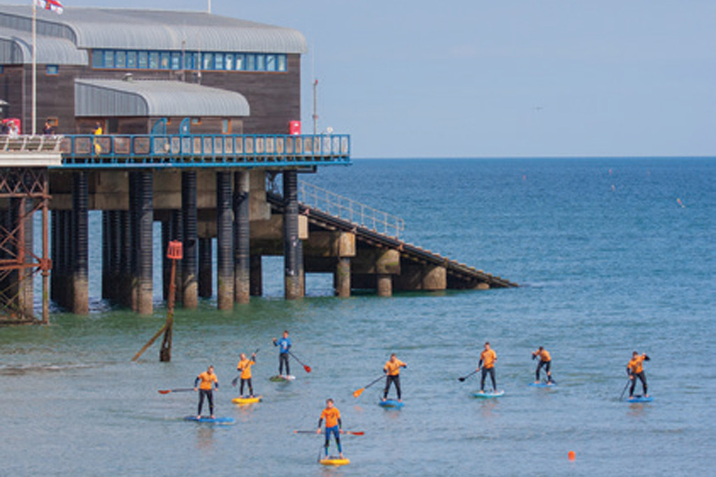 SUP Lessons Paddle-Boards-near-pier